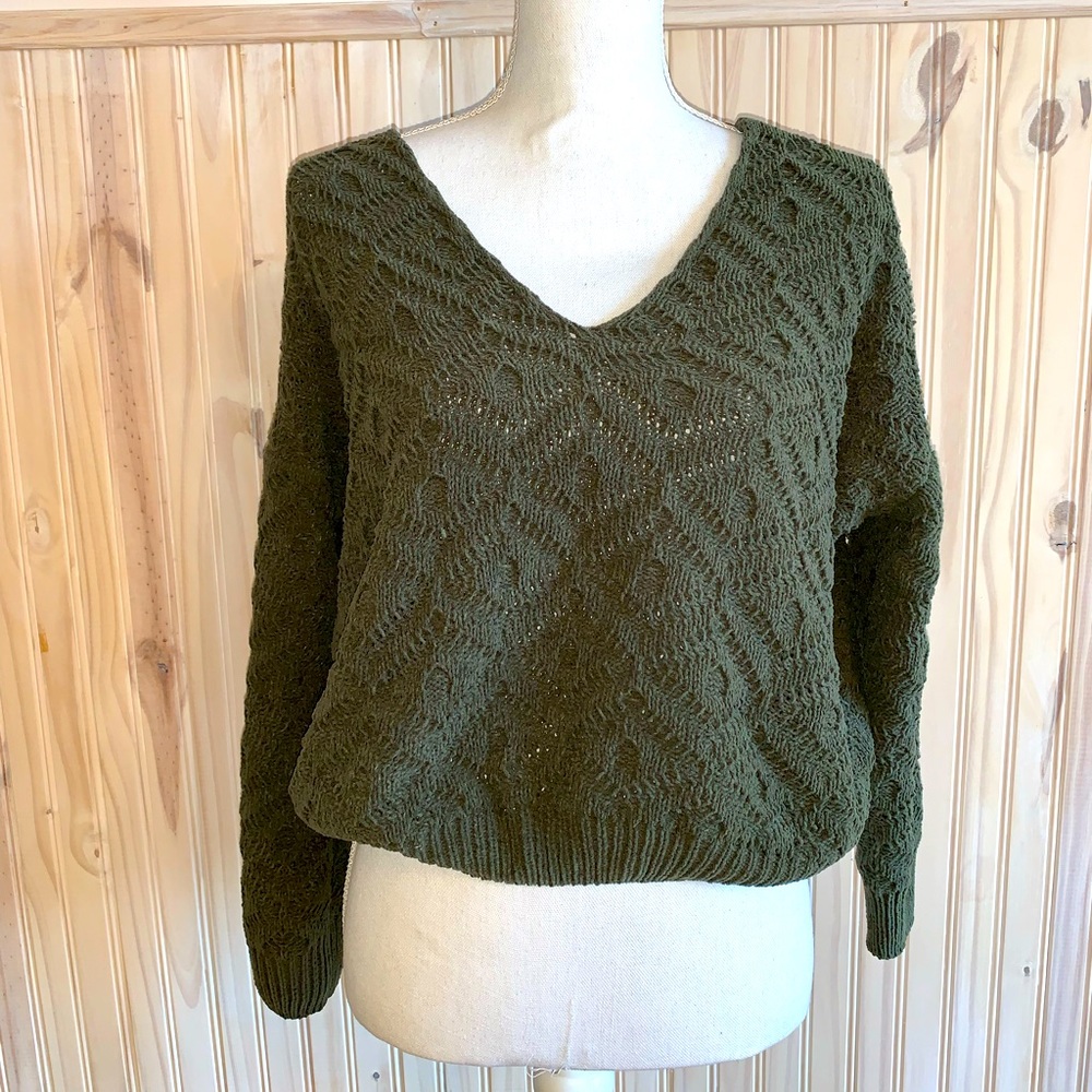 Green v-neck sweater